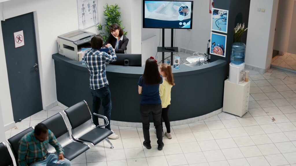 busy hospital reception waiting area with diverse patients having medical appointment checkup visit waiting clinic lobby attend healthcare consultation medicine support